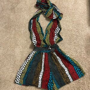 African print “infinity” romper that can be worn many ways! NWT..www.ofuure.com